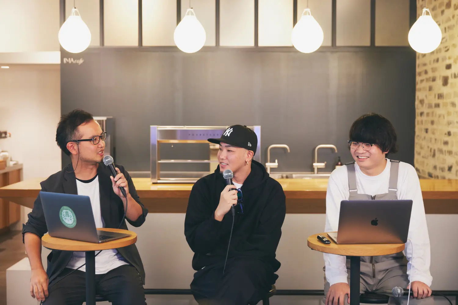Three speakers talking